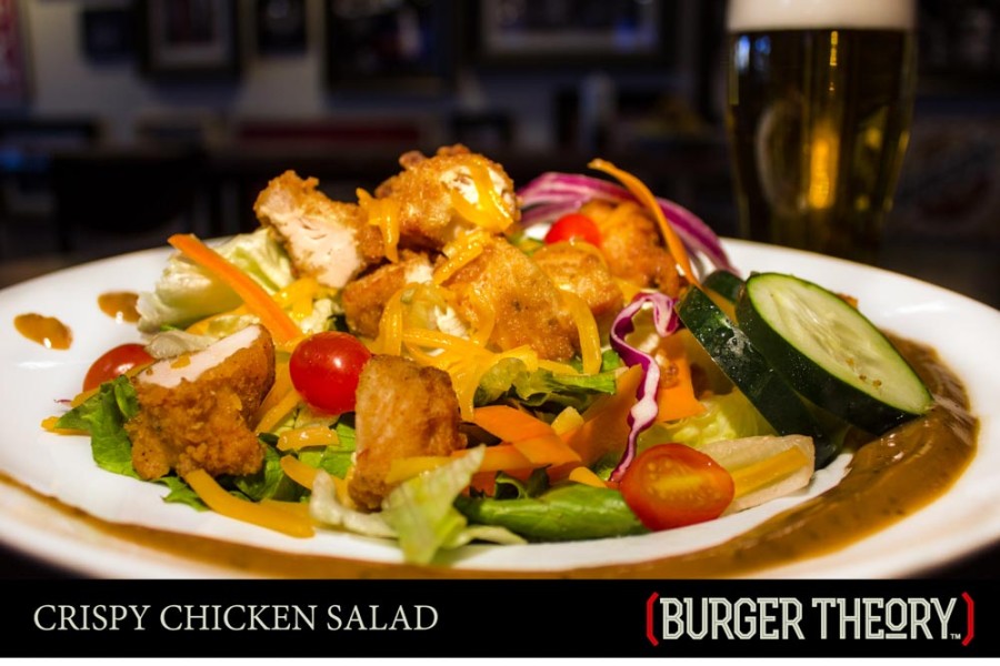 Burger Theory Phoenix - Crispy Chicken Salad - Fresh mixed greens • cucumbers • tomatoes • Cheddar cheese • crispy buttermilk chicken strips